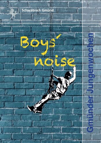 Titelblatt der Broschüre der Jungenwochen - Junge vor einer blauen Ziegelsteinmauer