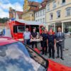 Zu sehen ist das  Feuerwehr-Team Schwäbisch Gmünd mit Erstem Bürgermeister Christian Baron